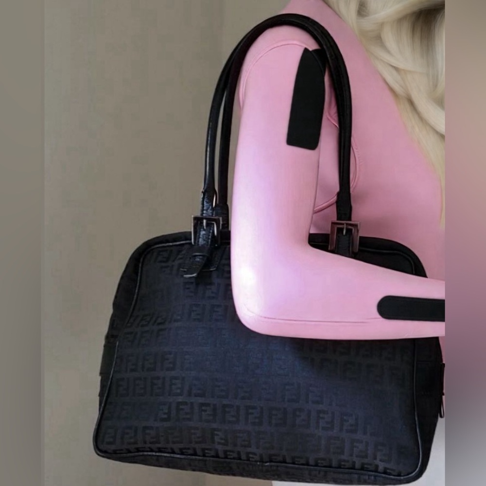 Authentic Fendi Zucchino Monogram canvas and leather tote bag in black.